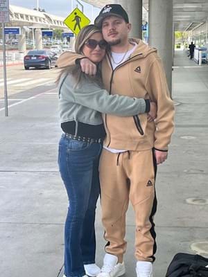 Rayne reunites with her son upon her release.